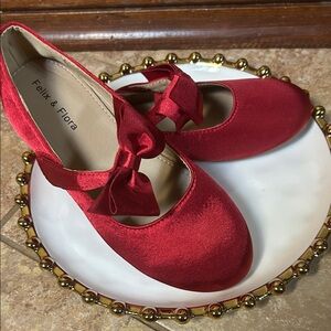 Felix & Flora red shoes.